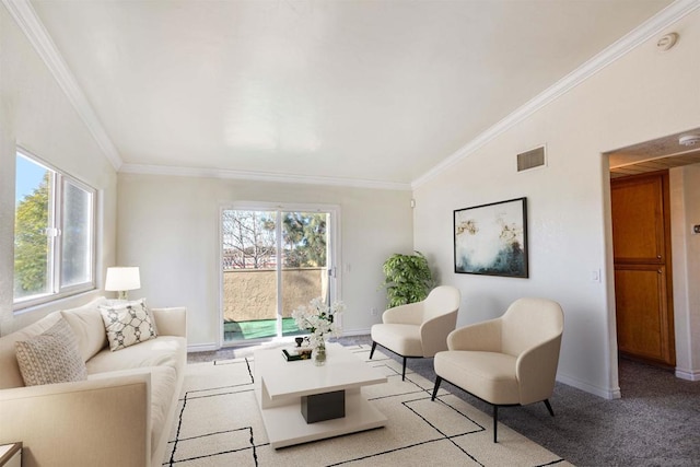 living room featuring ornamental molding and light carpet