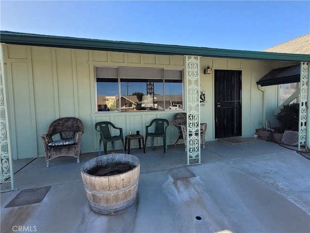 view of patio / terrace featuring an outdoor fire pit