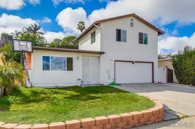 view of front facade featuring a garage and a front lawn