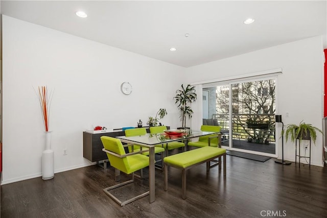 dining room featuring dark hardwood / wood-style flooring