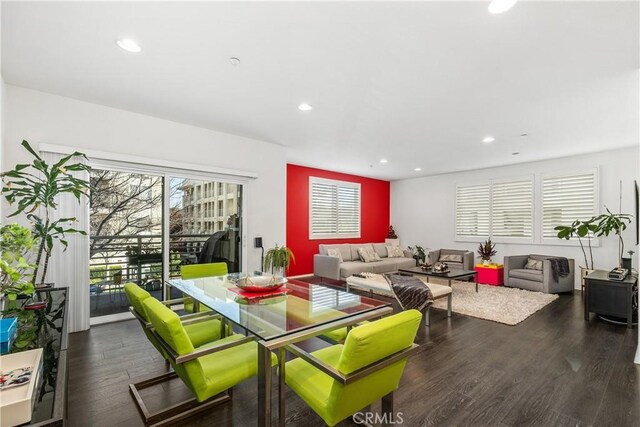 living room with dark hardwood / wood-style flooring