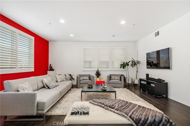 living room featuring dark hardwood / wood-style floors