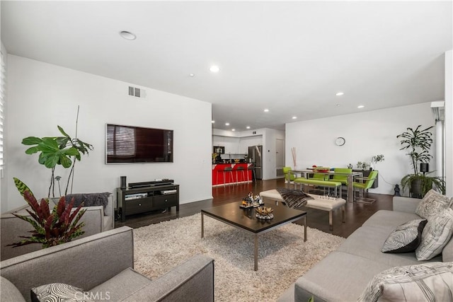 living room with wood-type flooring