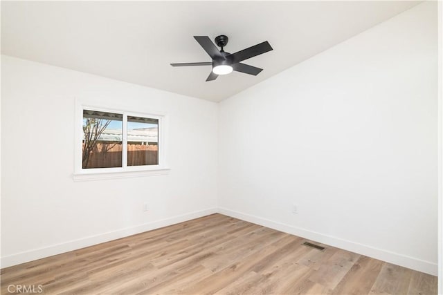 spare room featuring ceiling fan and light wood-type flooring