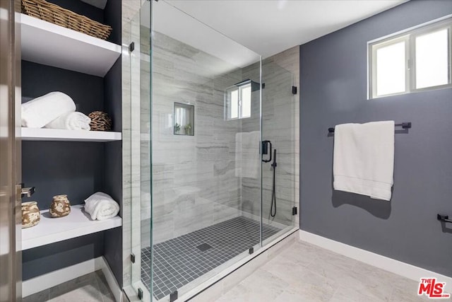 bathroom featuring walk in shower