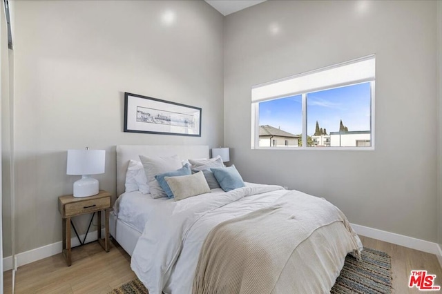 bedroom featuring light hardwood / wood-style floors