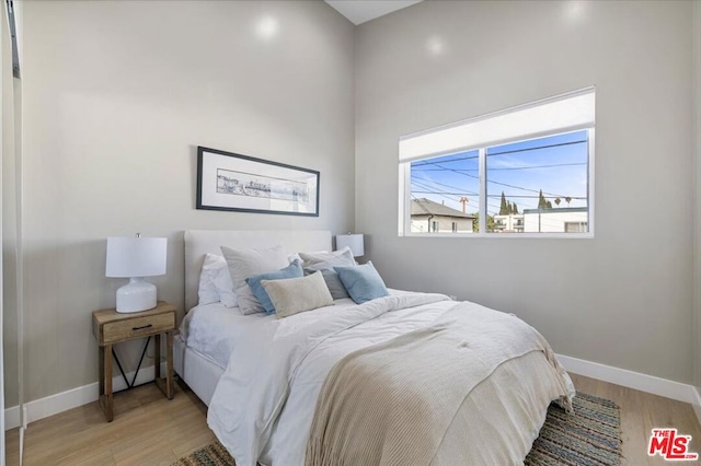 bedroom featuring light hardwood / wood-style floors