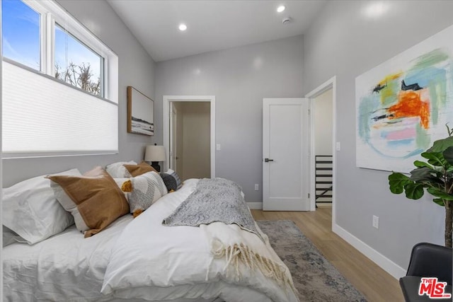 bedroom featuring light hardwood / wood-style floors