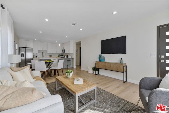 living room featuring light hardwood / wood-style flooring