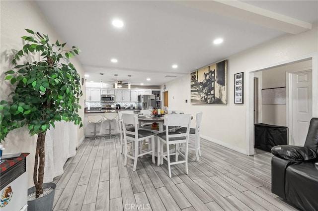 dining area with ceiling fan