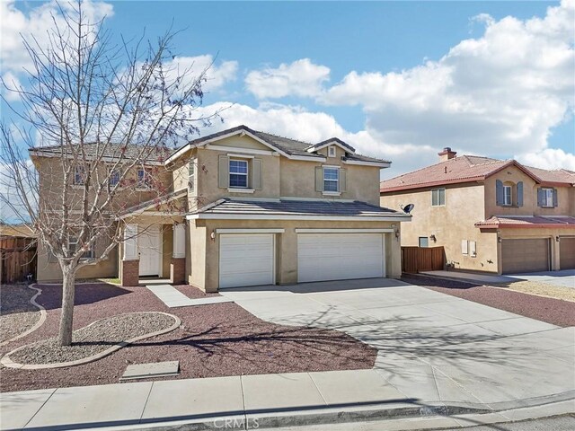 front of property featuring a garage