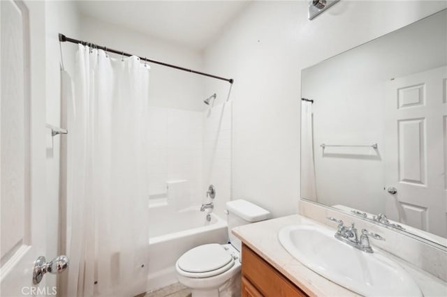 full bathroom with shower / tub combo with curtain, vanity, and toilet