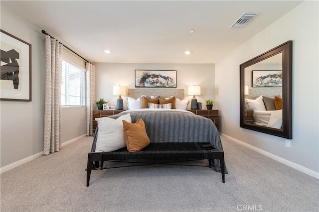 bedroom with light carpet