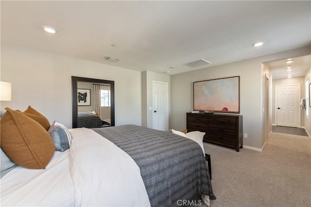 bedroom featuring light colored carpet