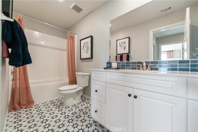 full bathroom with shower / bathtub combination with curtain, vanity, and toilet