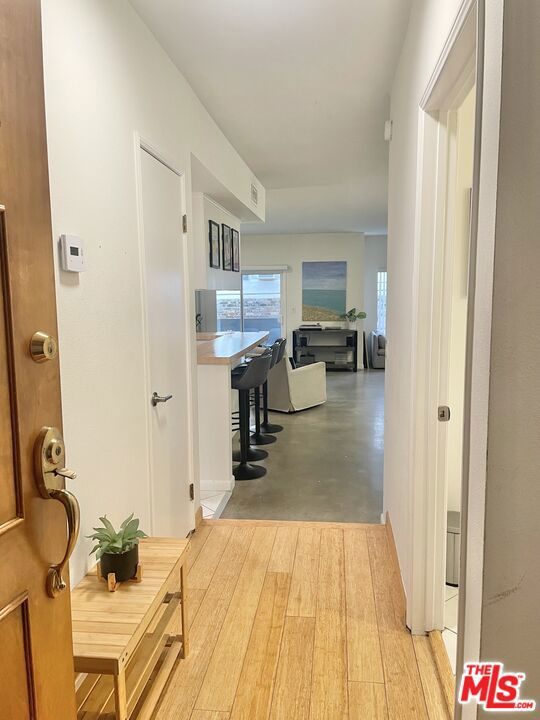 hallway featuring light wood-type flooring