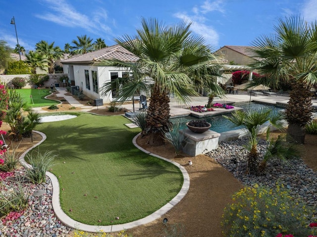 exterior space featuring a pool and a pergola