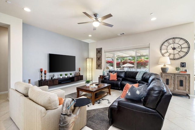 tiled living room featuring ceiling fan