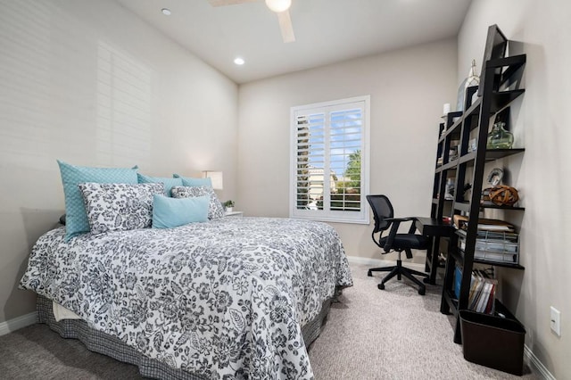 carpeted bedroom with ceiling fan