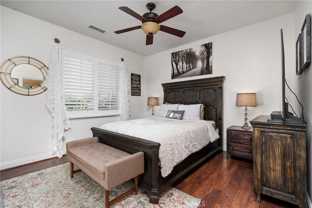 bedroom featuring dark wood-type flooring and ceiling fan