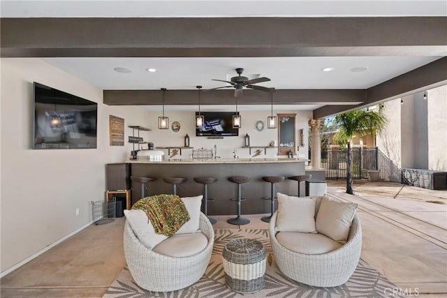 tiled living room with beamed ceiling and ceiling fan