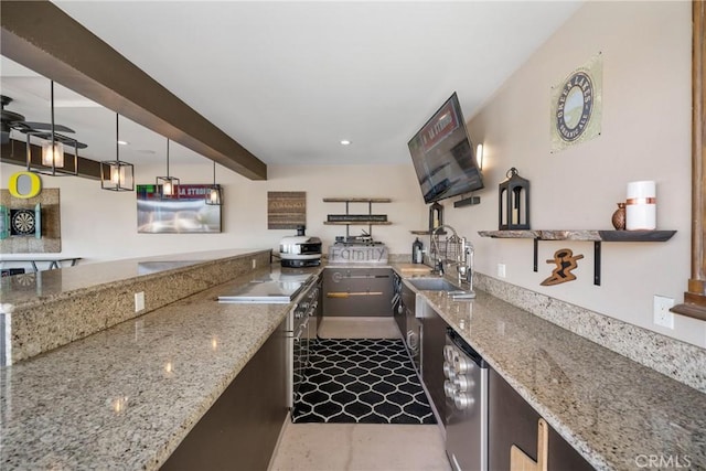 kitchen with light stone counters, ceiling fan, beam ceiling, and sink