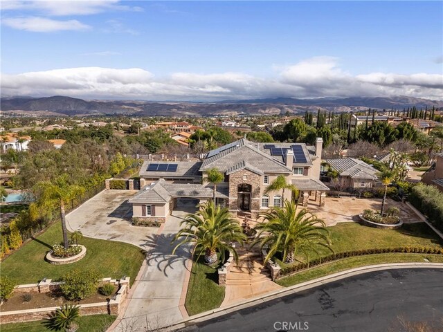 drone / aerial view featuring a mountain view