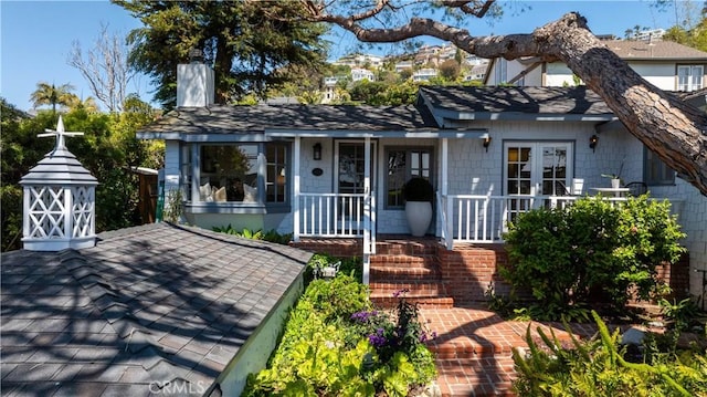 2130 Glenneyre St, Laguna Beach, CA 92651 - view of front of home featuring a chimney