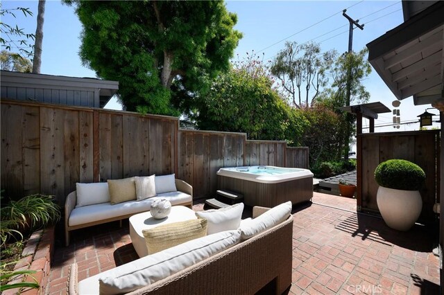 2130 Glenneyre St, Laguna Beach, CA 92651 - view of patio featuring a hot tub and an outdoor living space