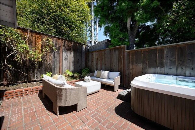 2130 Glenneyre St, Laguna Beach, CA 92651 - fenced backyard with a hot tub, a patio, and an outdoor hangout area