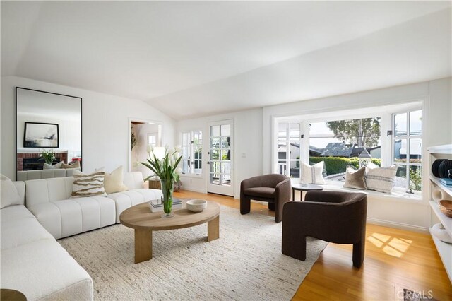 2130 Glenneyre St, Laguna Beach, CA 92651 - living room with lofted ceiling and wood finished floors