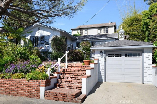 2130 Glenneyre St, Laguna Beach, CA 92651 - traditional-style home with an outbuilding and driveway