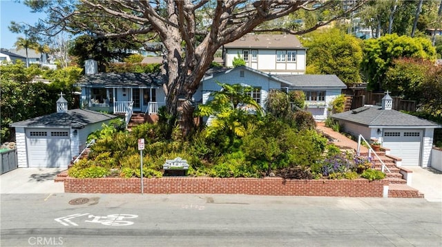 2130 Glenneyre St, Laguna Beach, CA 92651 - view of front of home with a residential view, concrete driveway, and a garage