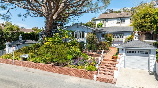 2130 Glenneyre St, Laguna Beach, CA 92651 - view of front of house with stairs and driveway