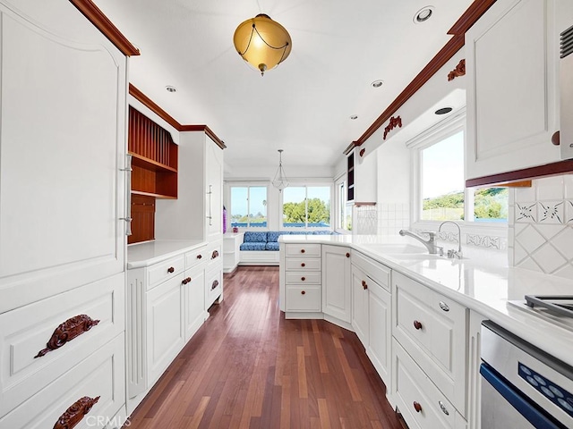 931 Gardenia Way, Corona Del Mar, CA 92625 - kitchen featuring oven, open shelves, dark wood-style flooring, backsplash, and a sink