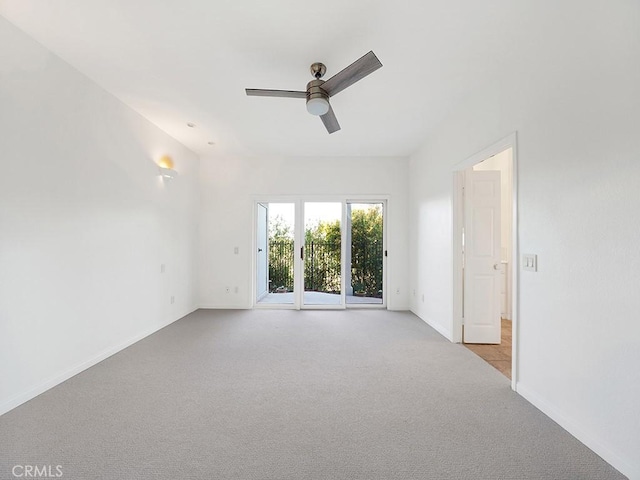 931 Gardenia Way, Corona Del Mar, CA 92625 - unfurnished room featuring a ceiling fan, baseboards, and light colored carpet