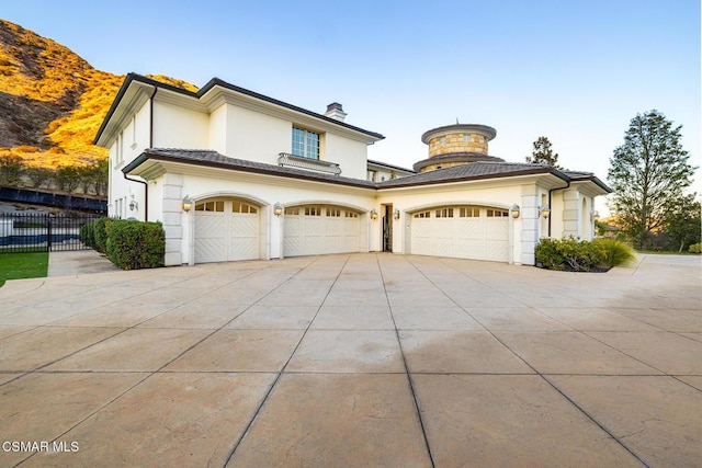 view of front of property with a garage