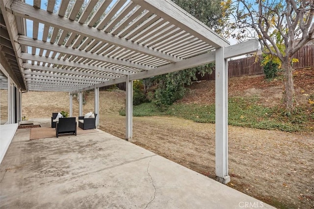 view of patio with outdoor lounge area and a pergola