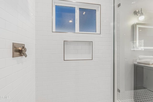 bathroom featuring an enclosed shower