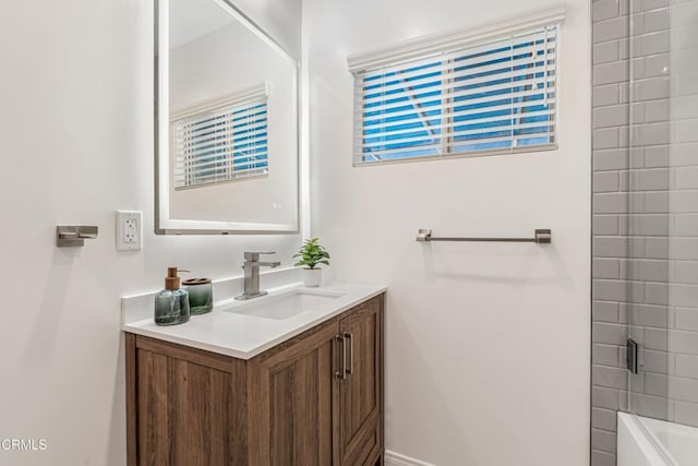 bathroom with vanity and shower / bathing tub combination