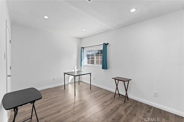 office space with hardwood / wood-style floors