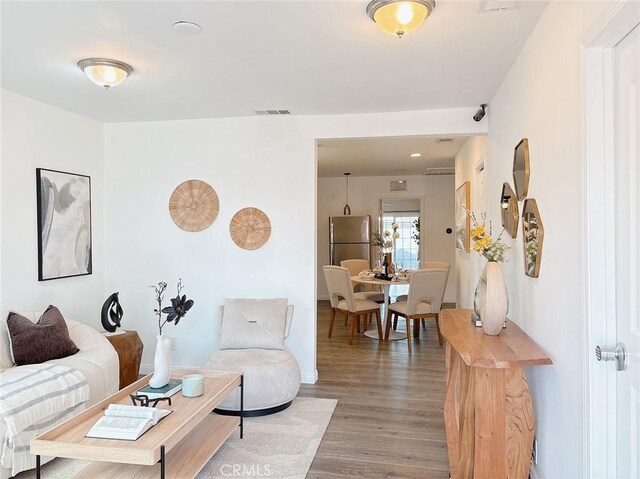 living room with wood-type flooring