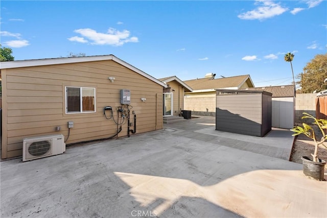 exterior space featuring ac unit and a patio area