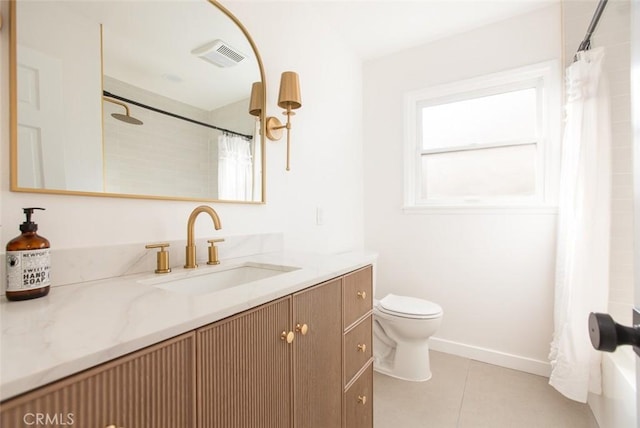 bathroom featuring tile patterned flooring, vanity, a shower with curtain, and toilet