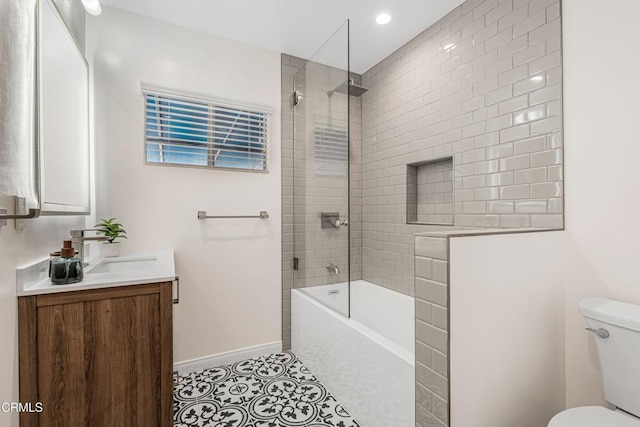 full bathroom featuring baseboards, toilet, recessed lighting, tile patterned floors, and vanity