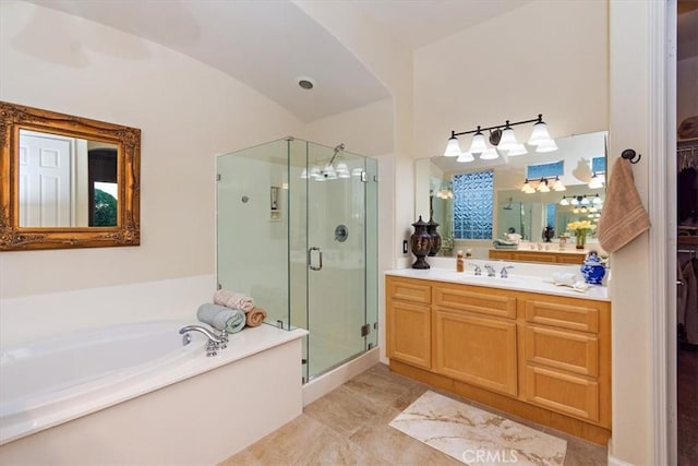 24238 Owl Ct, Corona, CA 92883 - bathroom with vanity, a stall shower, and a garden tub