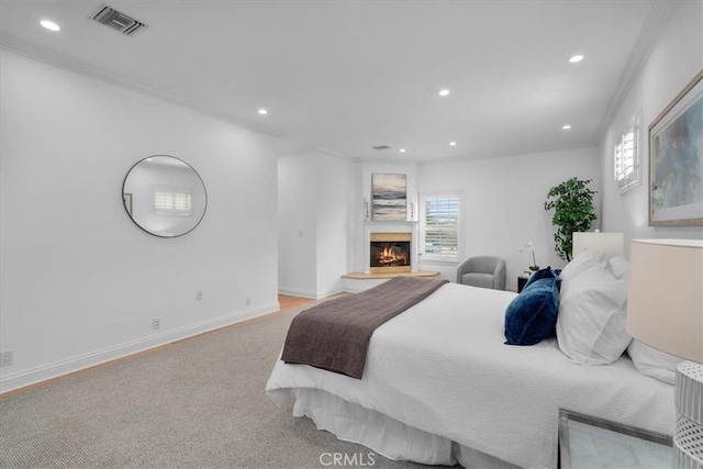 bedroom featuring light carpet