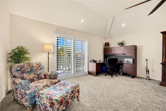 office featuring lofted ceiling, light carpet, and ceiling fan