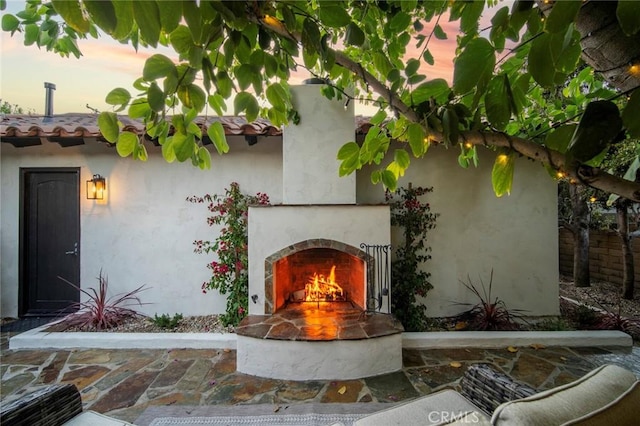 31872 Paseo Cielo, San Juan Capistrano, CA 92675 - view of patio / terrace with a lit fireplace