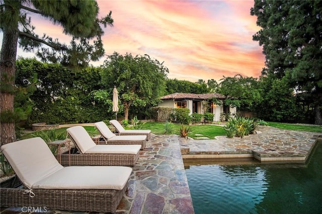 31872 Paseo Cielo, San Juan Capistrano, CA 92675 - patio terrace at dusk with a patio area and an outdoor structure
